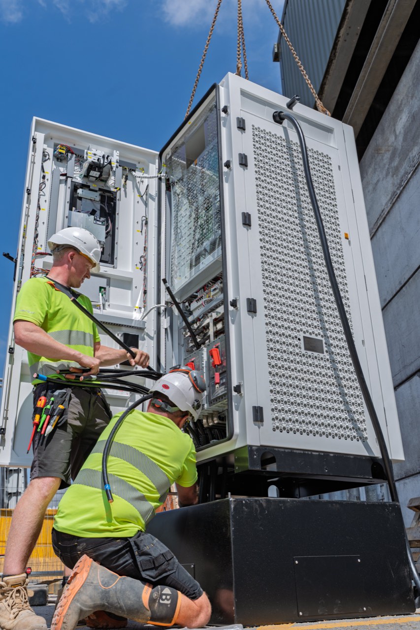 Electricians terminating cabling at Vale Green Energy, Rotherdale Farm
